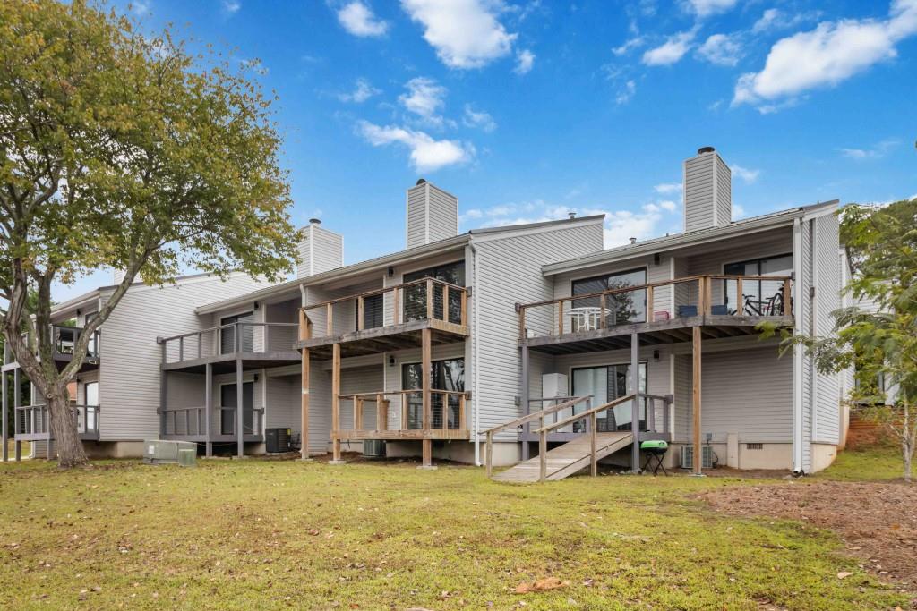 266 Clearview Court, Unit 266 Villa Rica, GA 30180 - Photo 27 of 32 a view of a house with swimming pool and sitting area