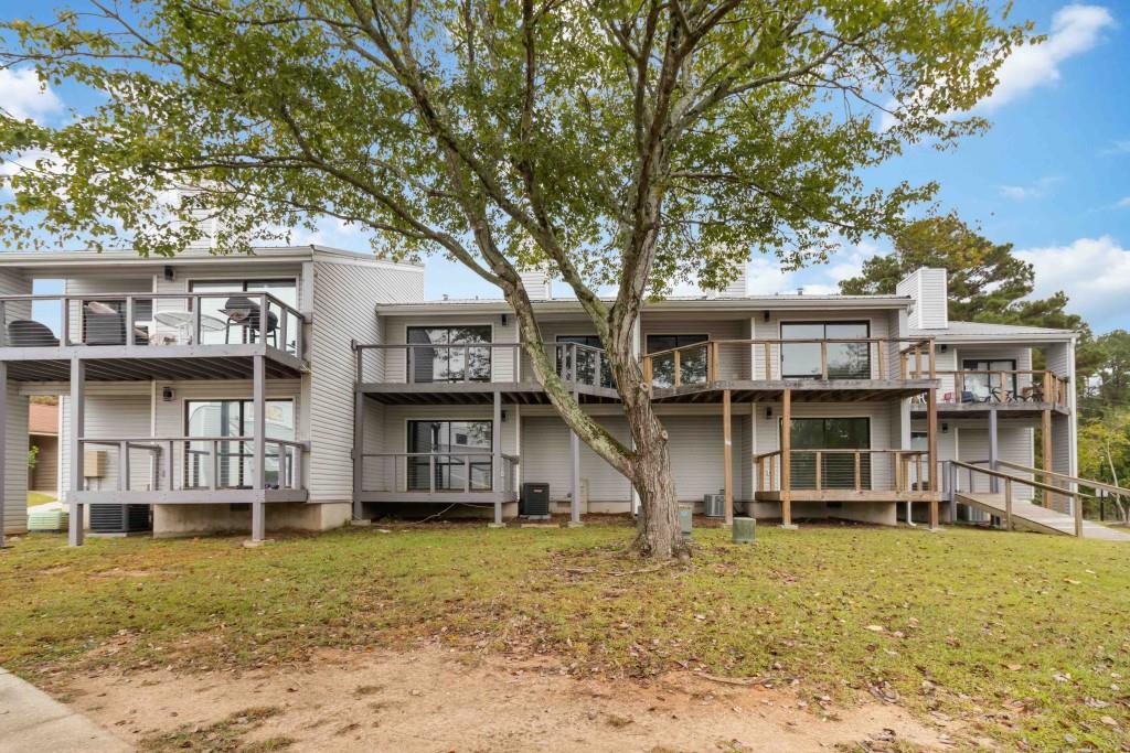 266 Clearview Court, Unit 266 Villa Rica, GA 30180 - Photo 28 of 32 front view of a house with a large tree