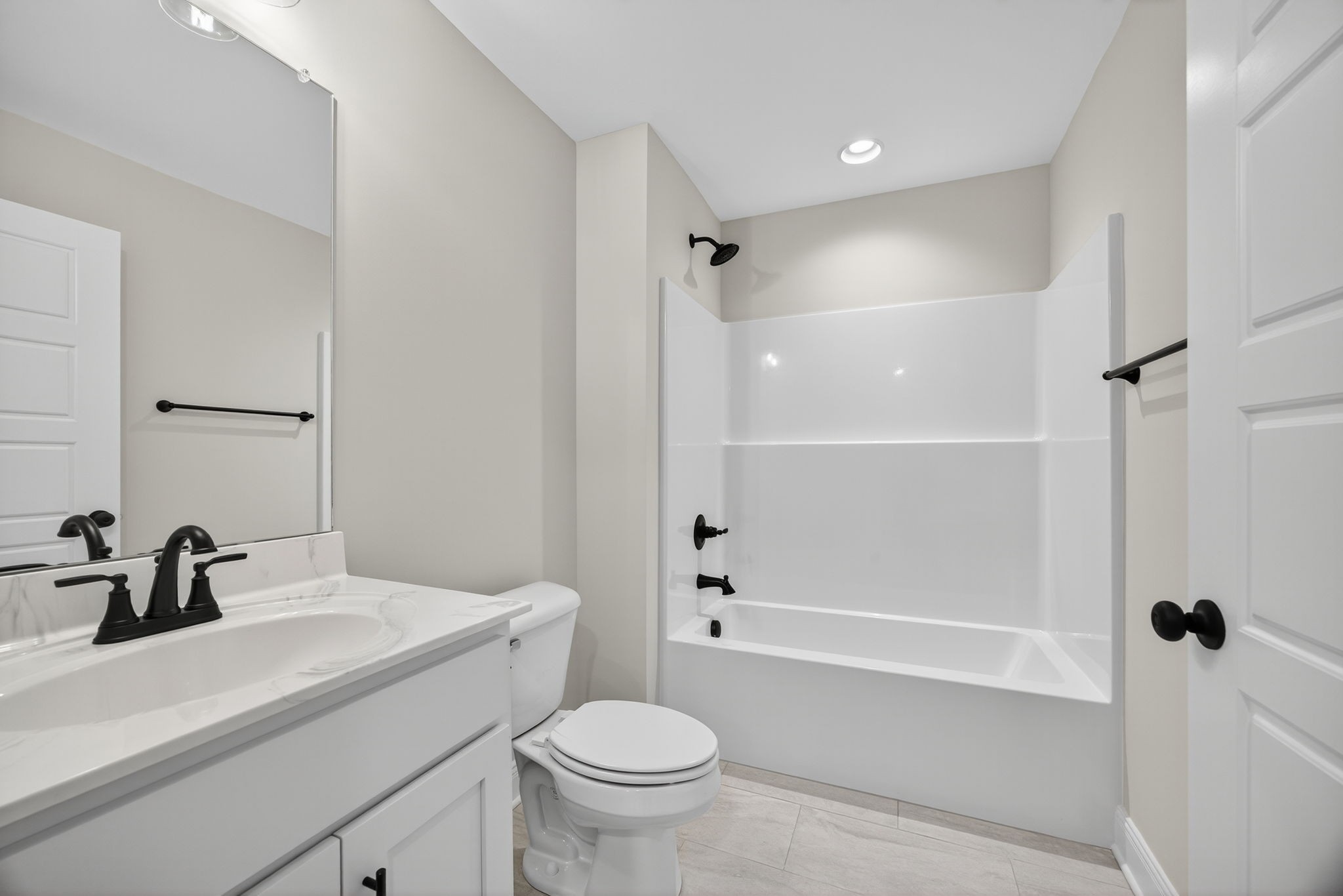 2111 Rylee Way, Unit 9 Greenbrier, TN 37073 - Photo 17 of 33 a bathroom with a sink a toilet and a mirror