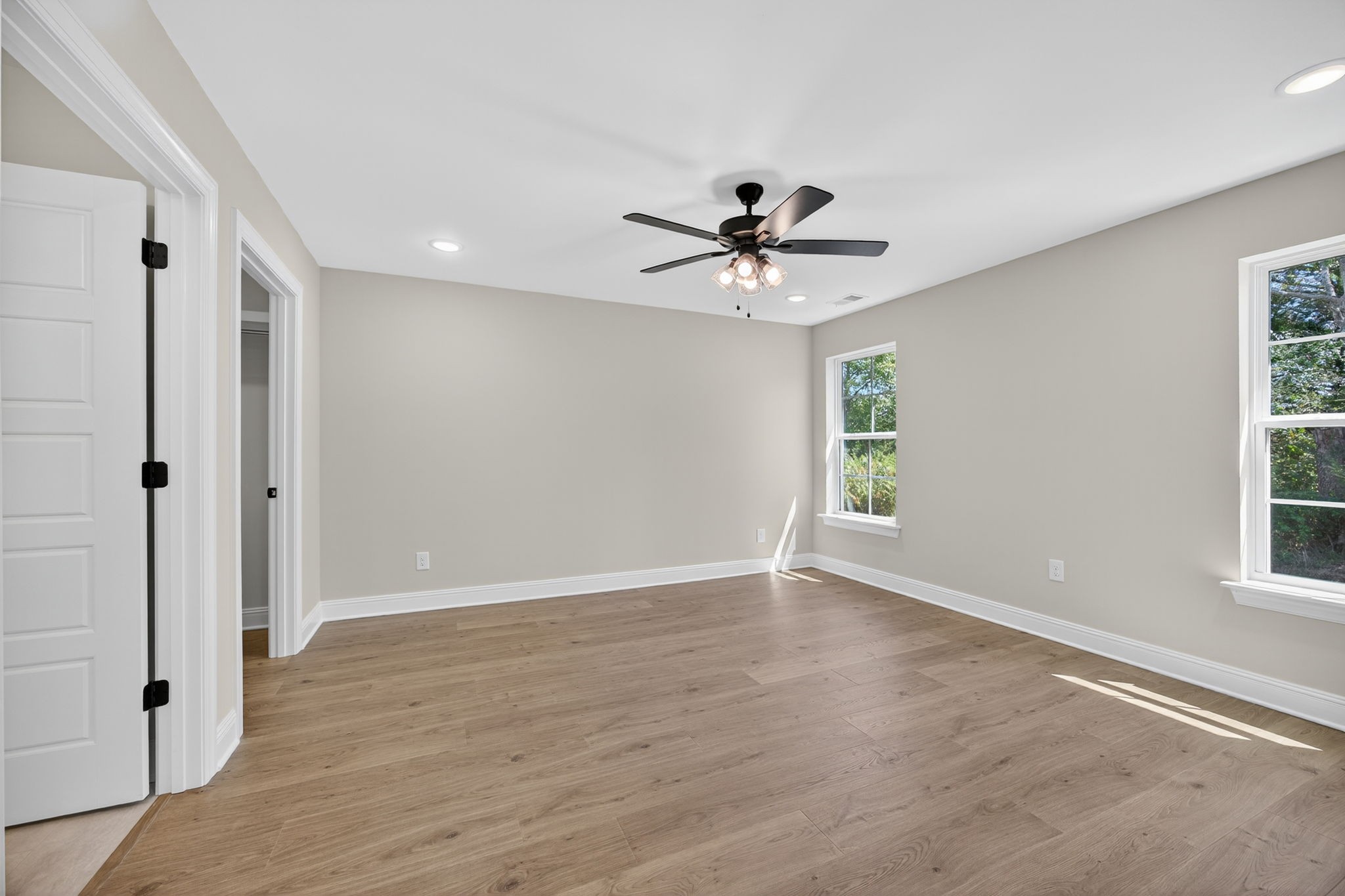 2111 Rylee Way, Unit 9 Greenbrier, TN 37073 - Photo 25 of 33 a view of an empty room with wooden floor and a window