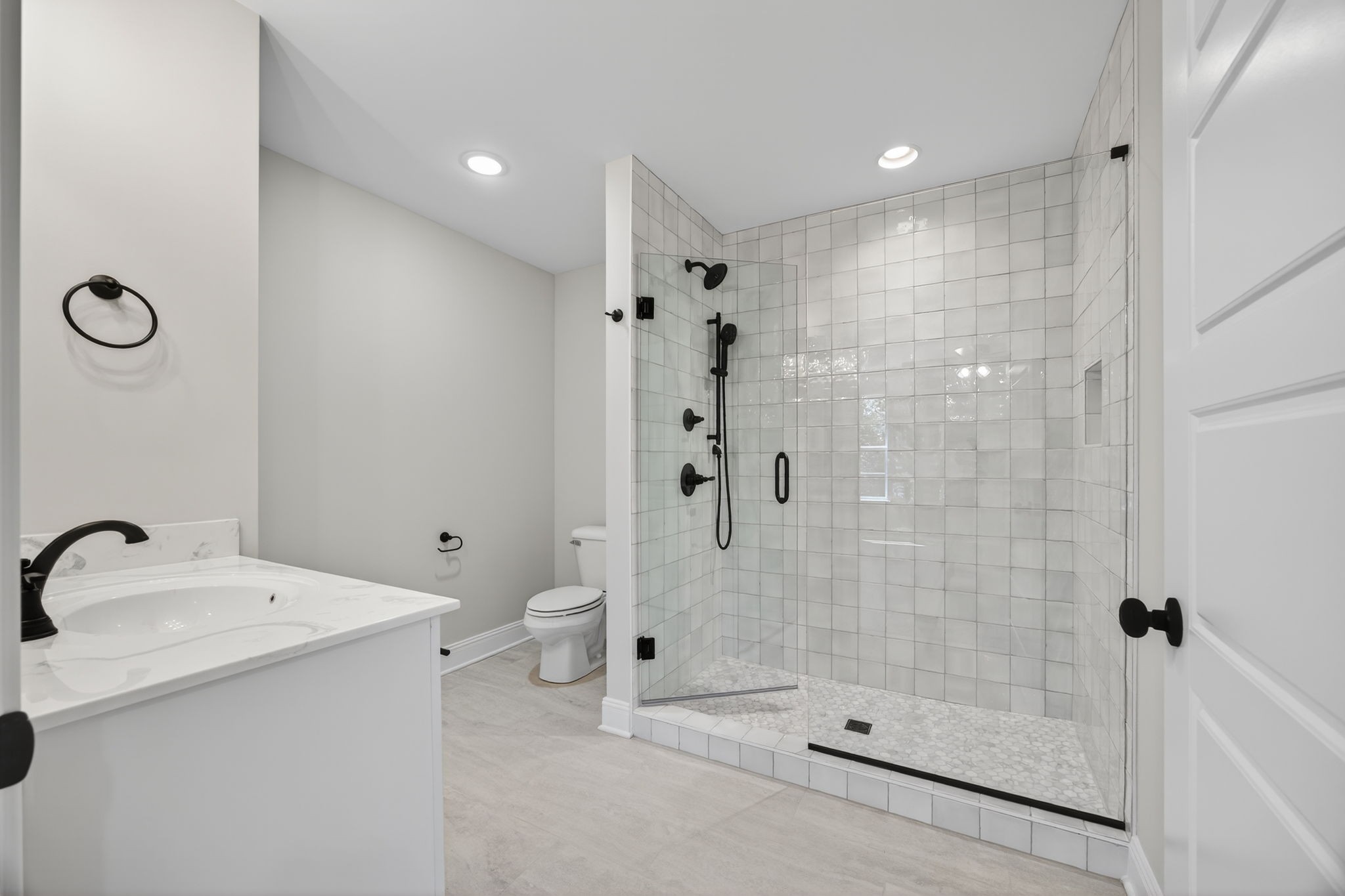 2111 Rylee Way, Unit 9 Greenbrier, TN 37073 - Photo 27 of 33 a bathroom with a shower and a sink