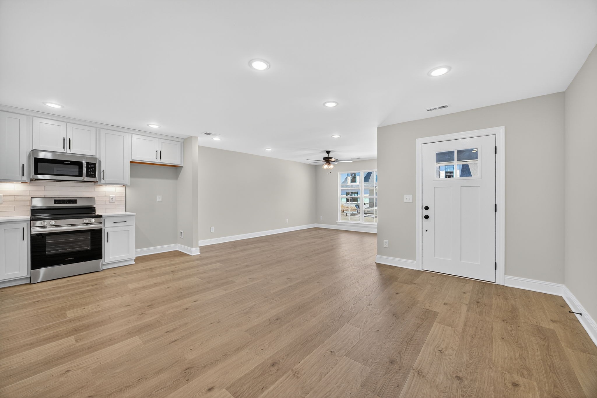 2111 Rylee Way, Unit 9 Greenbrier, TN 37073 - Photo 7 of 33 a view of kitchen with microwave and stove