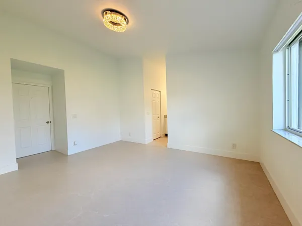 an empty room with windows
