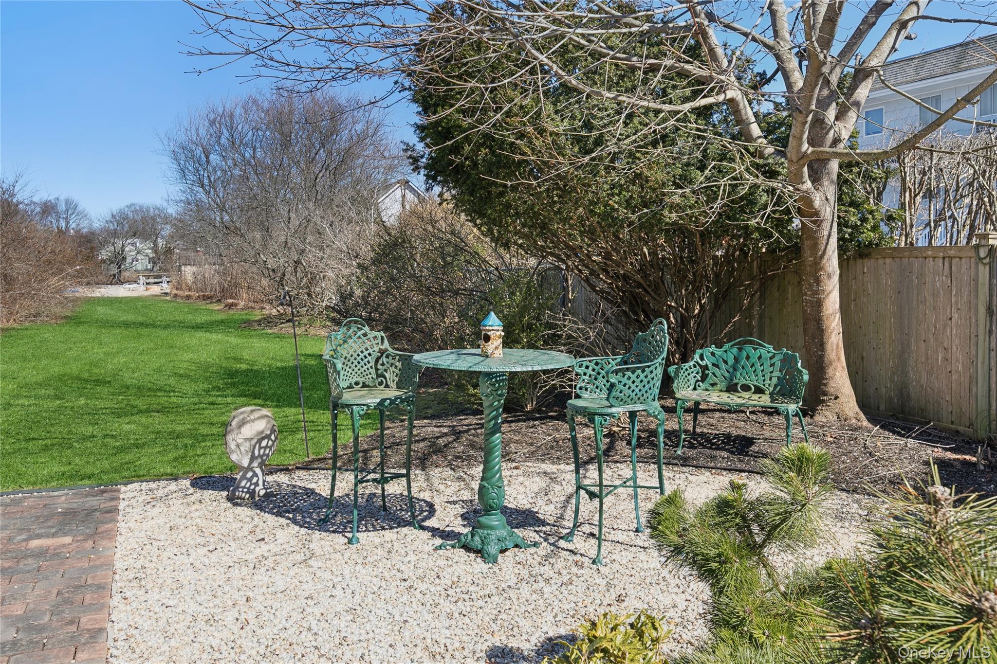20 Mitchell Road Westhampton Beach, NY 11978 - Photo 21 of 34 a garden view with a seating space