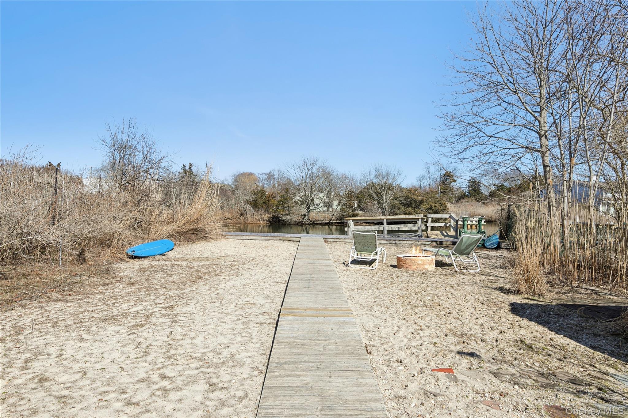 20 Mitchell Road Westhampton Beach, NY 11978 - Photo 27 of 34 a view of a terrace with trees