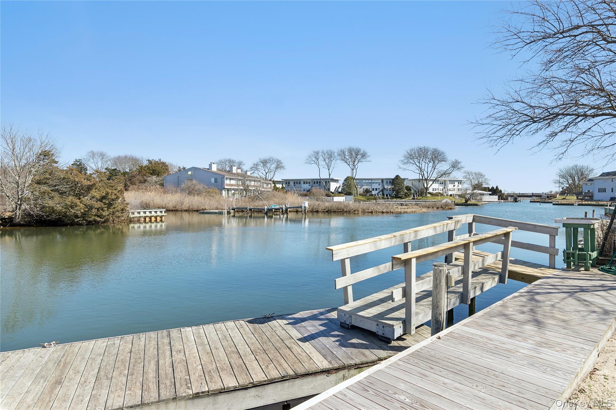 20 Mitchell Road Westhampton Beach, NY 11978 - Photo 33 of 34 a view of a lake with houses