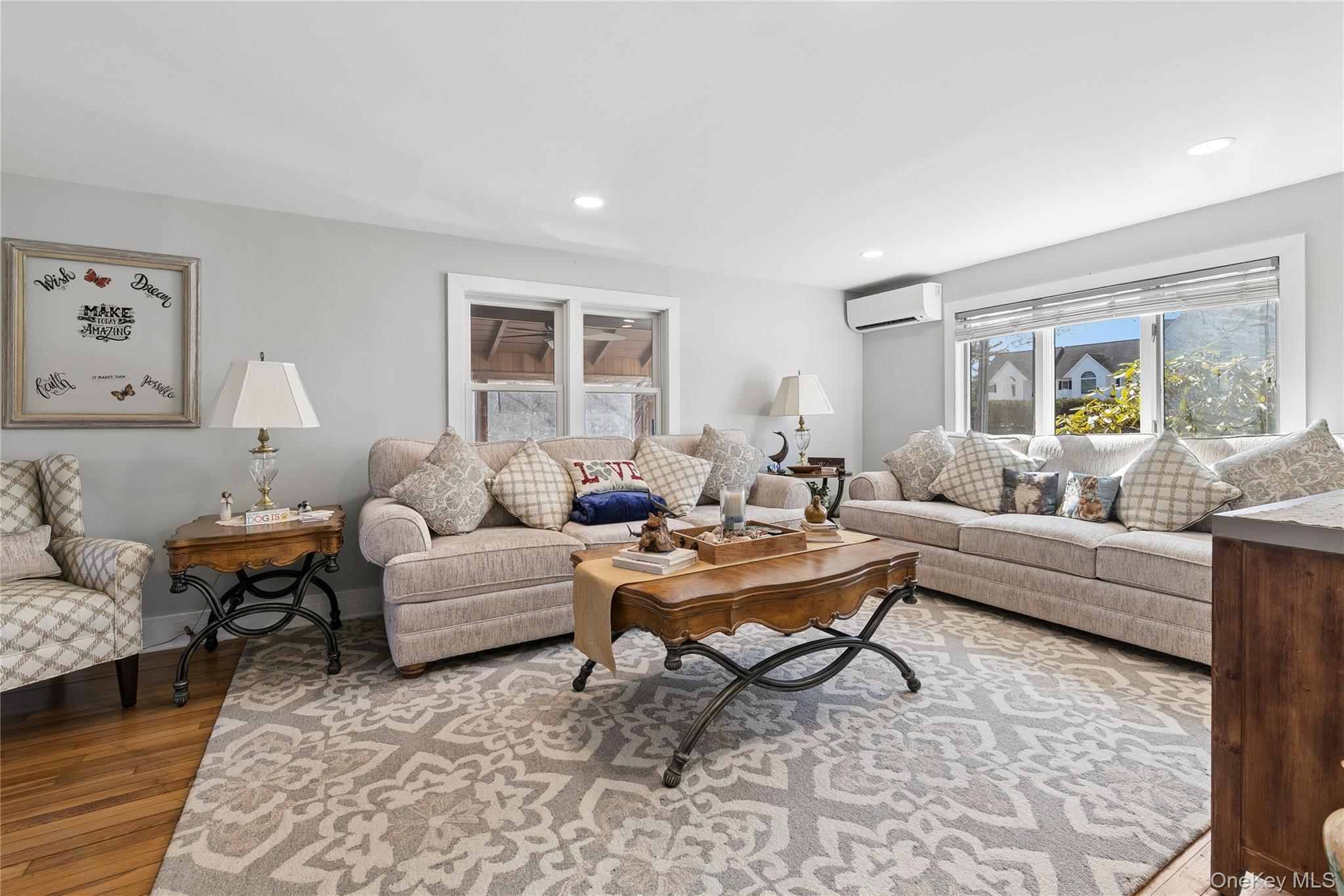 20 Mitchell Road Westhampton Beach, NY 11978 - Photo 4 of 34 a living room with furniture and a couch