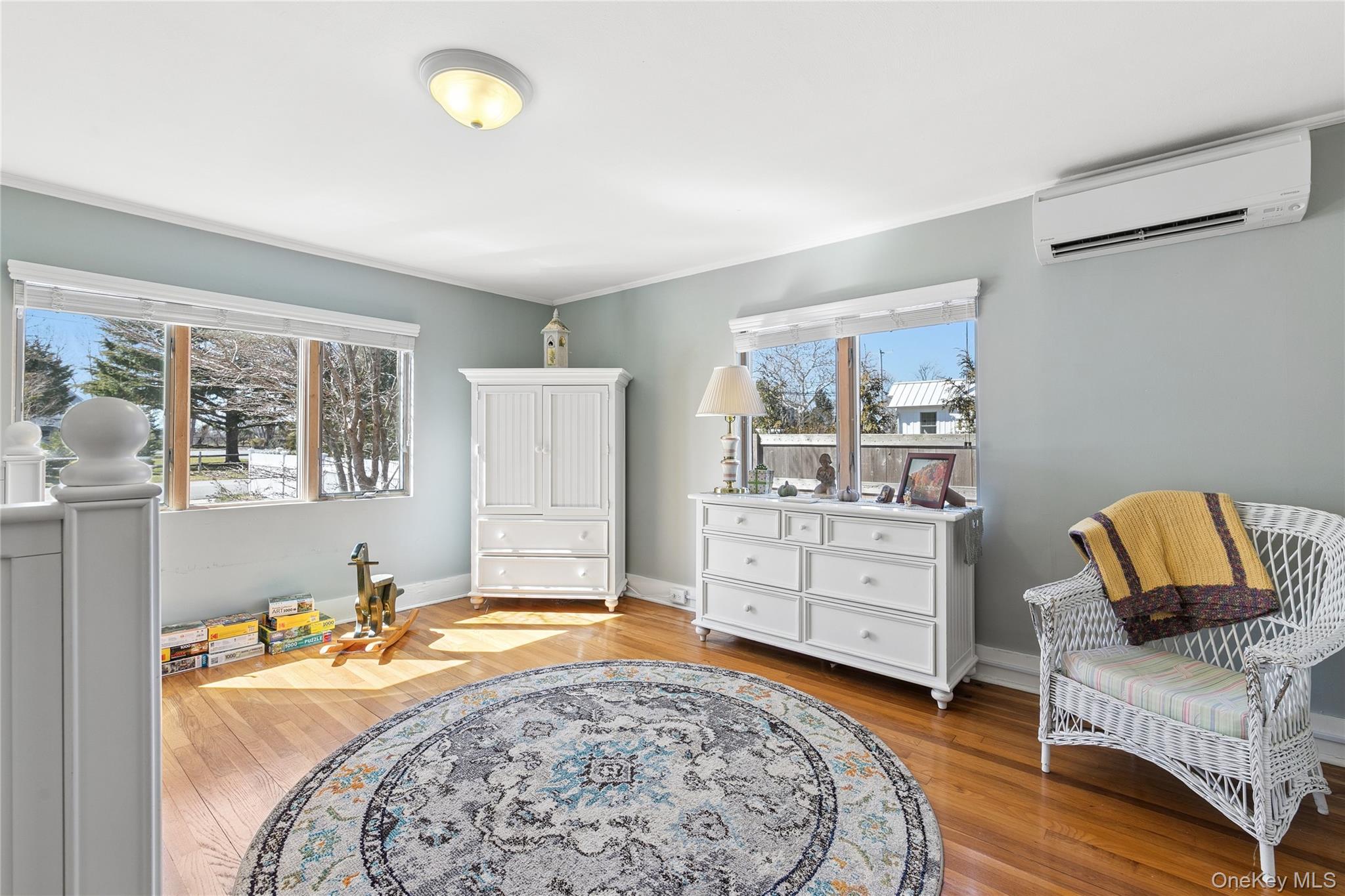 20 Mitchell Road Westhampton Beach, NY 11978 - Photo 10 of 34 a bed room with a bed and a window