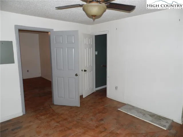 a bathroom with a shower and a sink