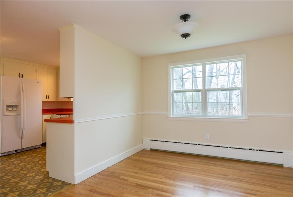 9 Katahdin Road Cape Elizabeth, ME 04107 - Photo 7 of 33 The dining room abuts the kitchen...