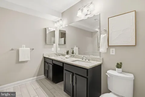 a bathroom with a tub and shower