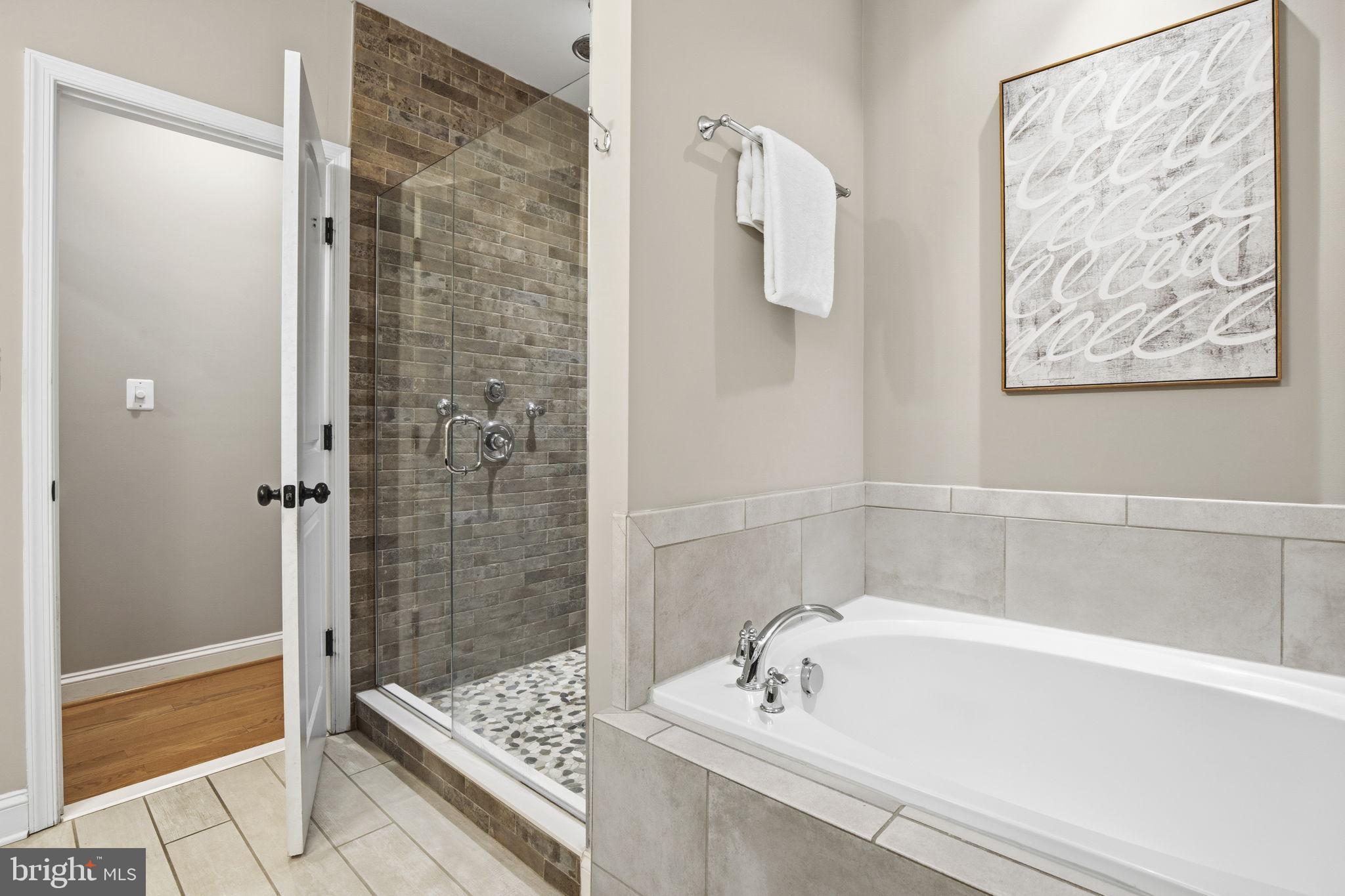 1131 William Street Baltimore, MD 21230 - Photo 16 of 40 En-Suite Bathroom in Primary with Shower and Tab