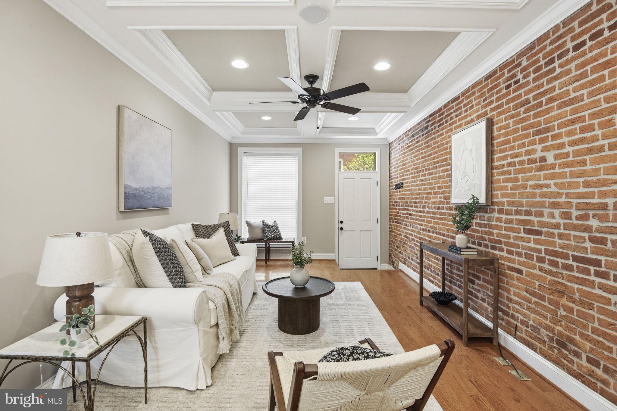 1131 William Street Baltimore, MD 21230 - Photo 3 of 40 Living Room with exposed brick and hardwood floors