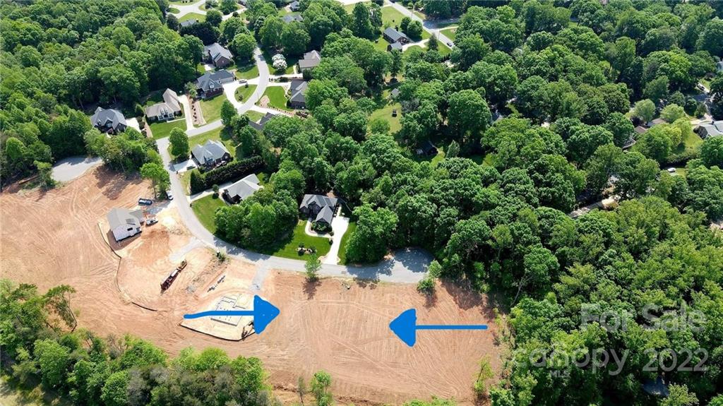 205 9th Street Northeast, Unit 80 Conover, NC 28613 - Photo 1 of 2 an aerial view of a house with a yard