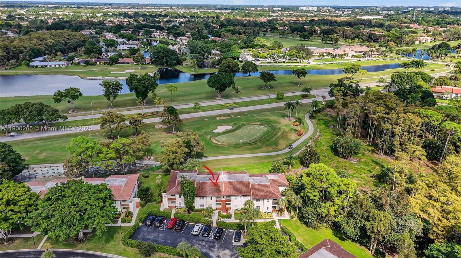 21860 Arriba Real, Unit 4D Boca Raton, FL 33433 - Photo 34 of 55 an aerial view of residential houses with outdoor space and lake view
