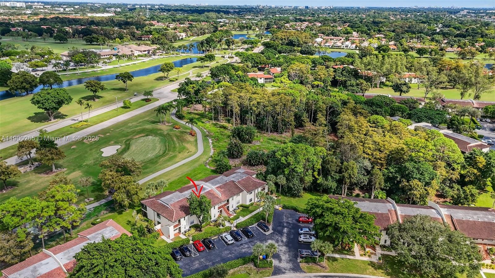 21860 Arriba Real, Unit 4D Boca Raton, FL 33433 - Photo 36 of 55 an aerial view of a residential houses with outdoor space and trees