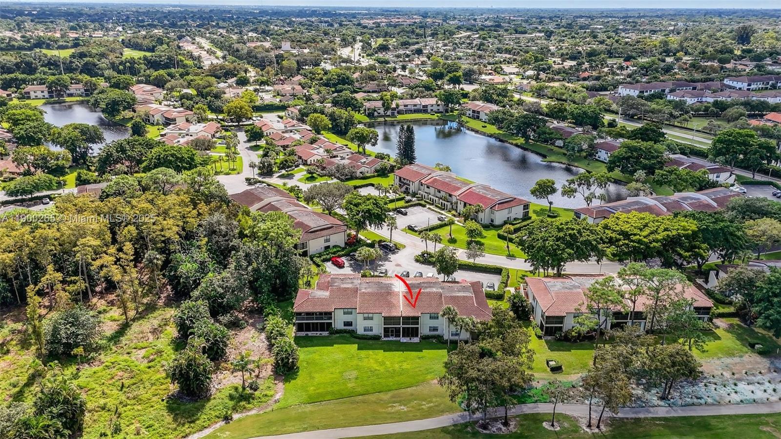21860 Arriba Real, Unit 4D Boca Raton, FL 33433 - Photo 39 of 55 an aerial view of residential houses with outdoor space and trees