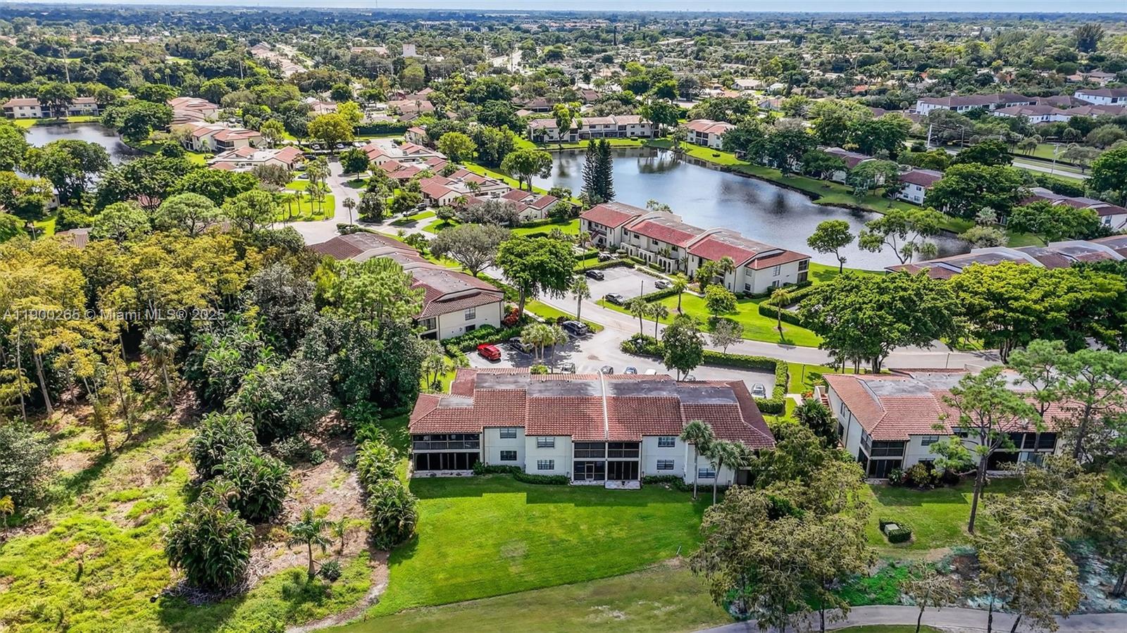 21860 Arriba Real, Unit 4D Boca Raton, FL 33433 - Photo 40 of 55 an aerial view of house with yard swimming pool and outdoor seating