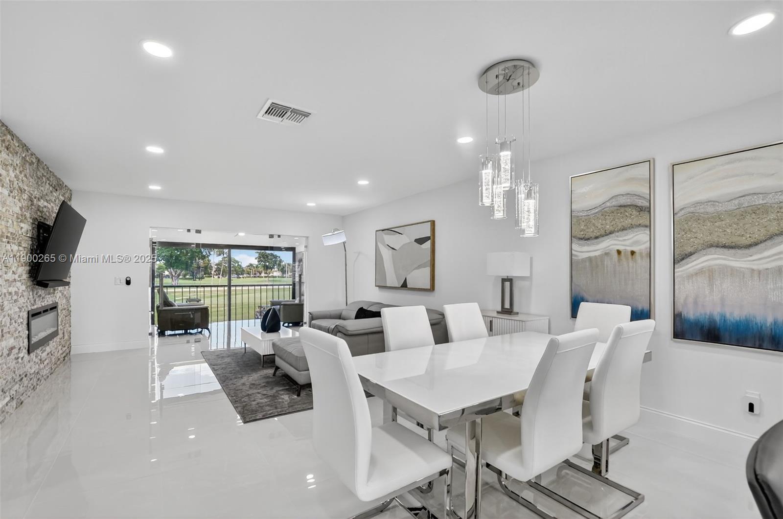 21860 Arriba Real, Unit 4D Boca Raton, FL 33433 - Photo 7 of 55 a view of a dining room with furniture