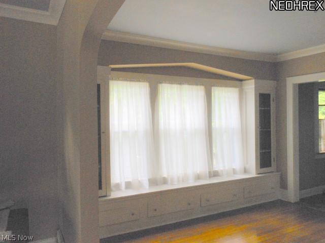 2017 Hilton Road Cleveland, OH 44112 - Photo 16 of 25 2nd Floor Dining Room with Leaded China Cabinets and Window Seat Storage (painted)