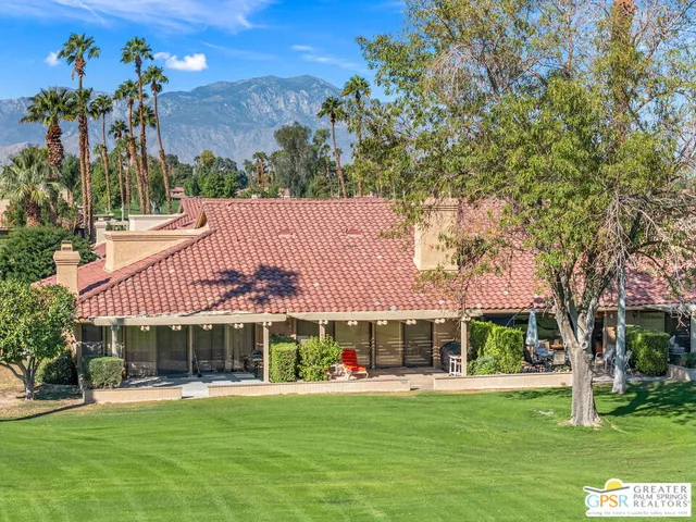 a view of a city with an ocean view