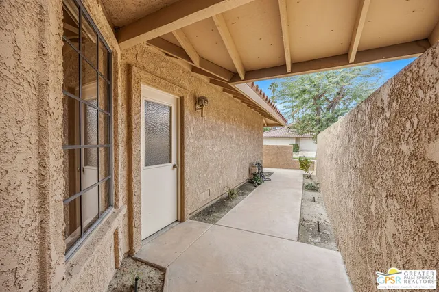 a house view with a backyard