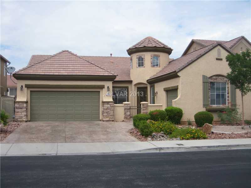 Facade/Exterior Front. Stone, shutters, courtyard, stamped concrete, fountain, EZ & gorgeous landscape, access to yard.