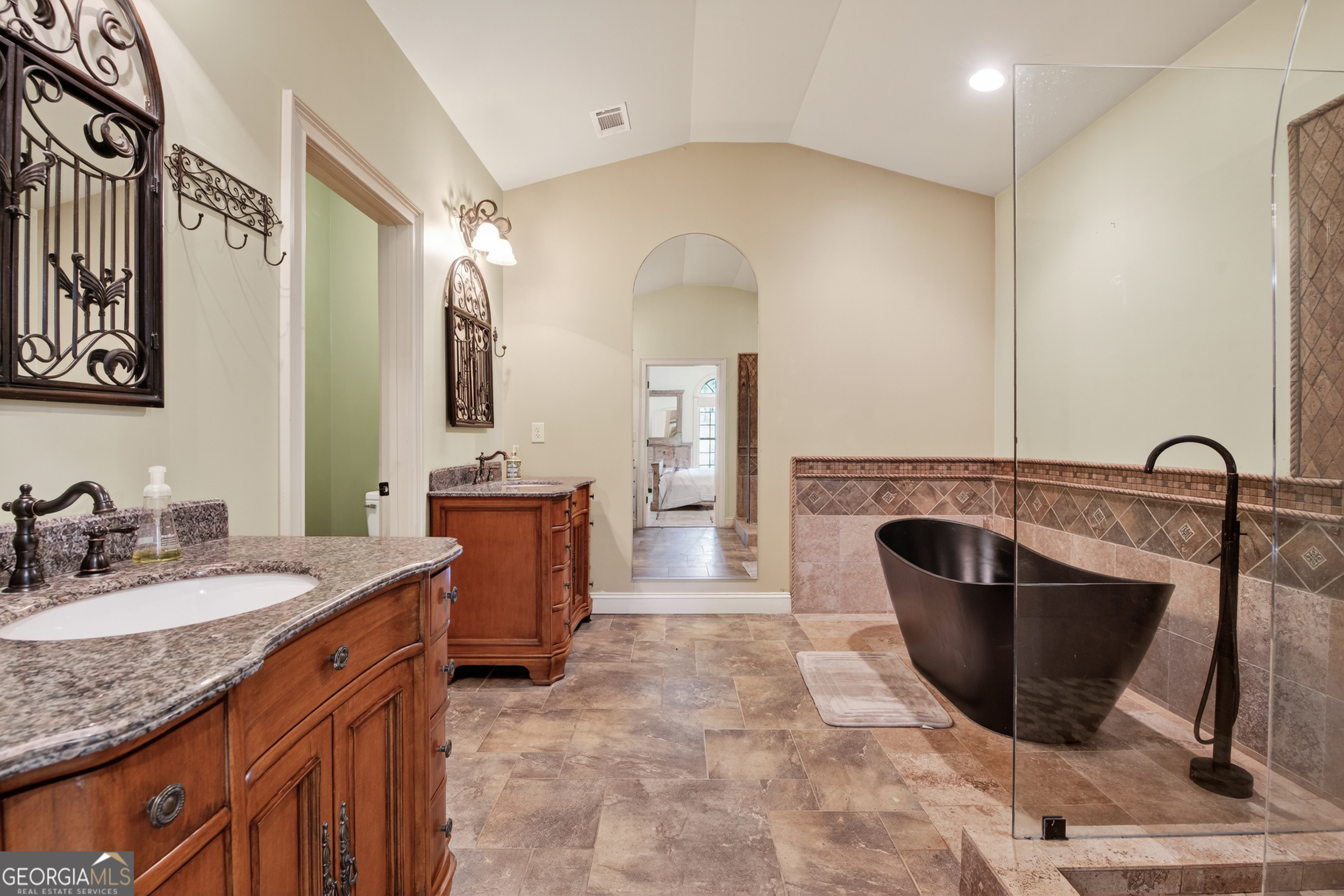 1583 Hickory Flat Road Gillsville, GA 30543 - Photo 24 of 79 a bathroom with a granite countertop sink a toilet and mirror