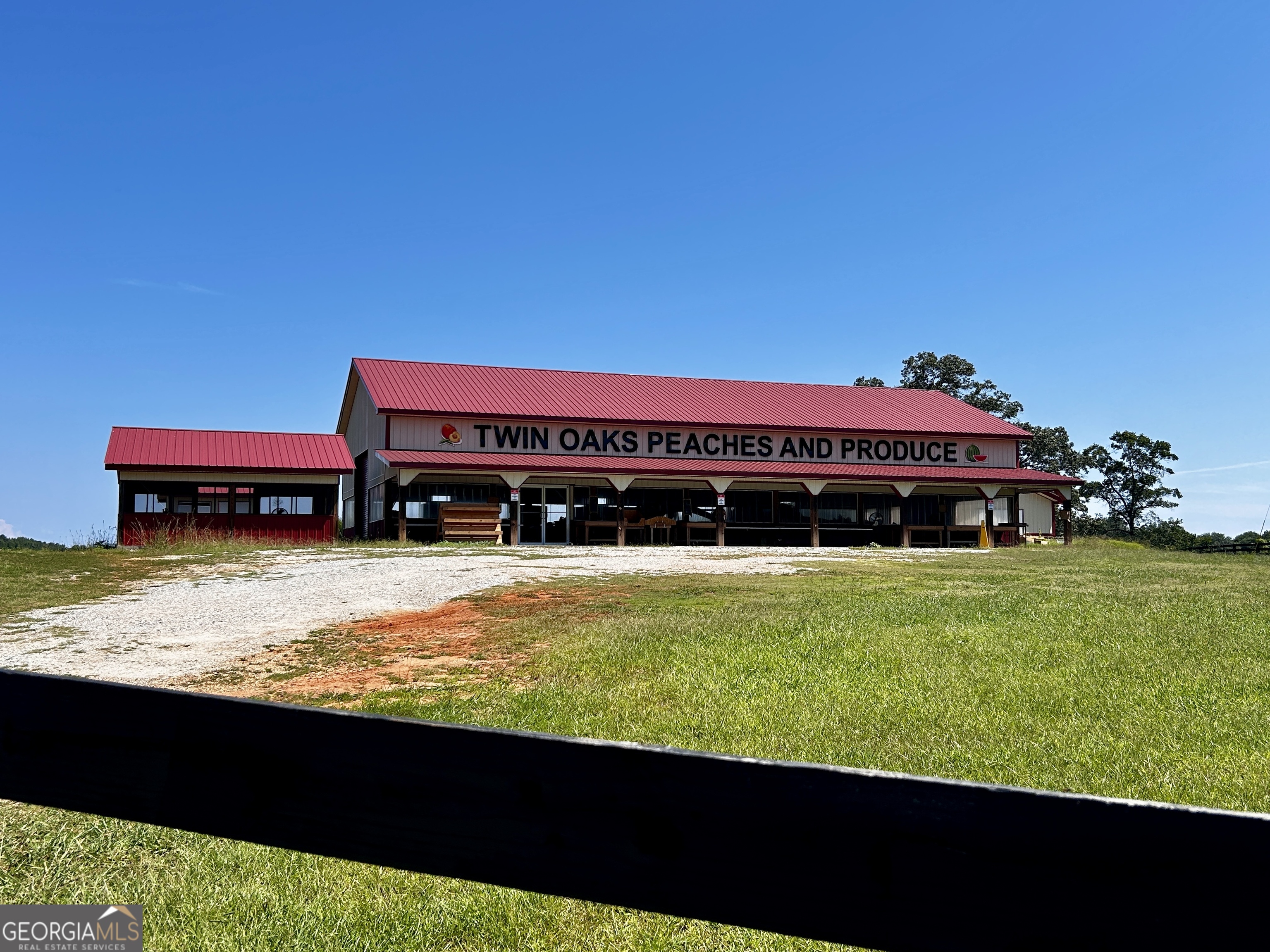 1583 Hickory Flat Road Gillsville, GA 30543 - Photo 76 of 79 a view of a swimming pool with a table and chairs