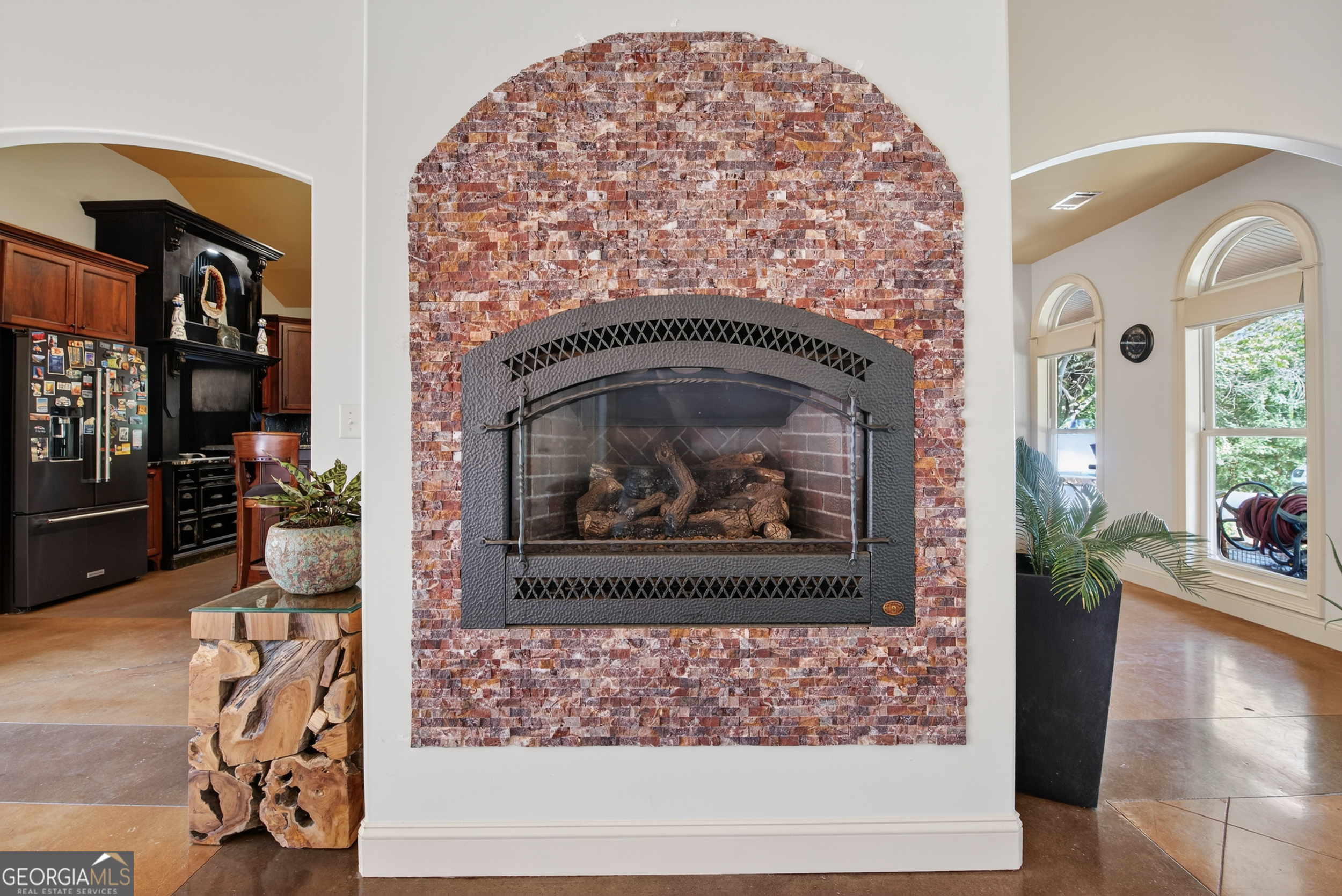 1583 Hickory Flat Road Gillsville, GA 30543 - Photo 10 of 79 a living room with a rug and a fireplace