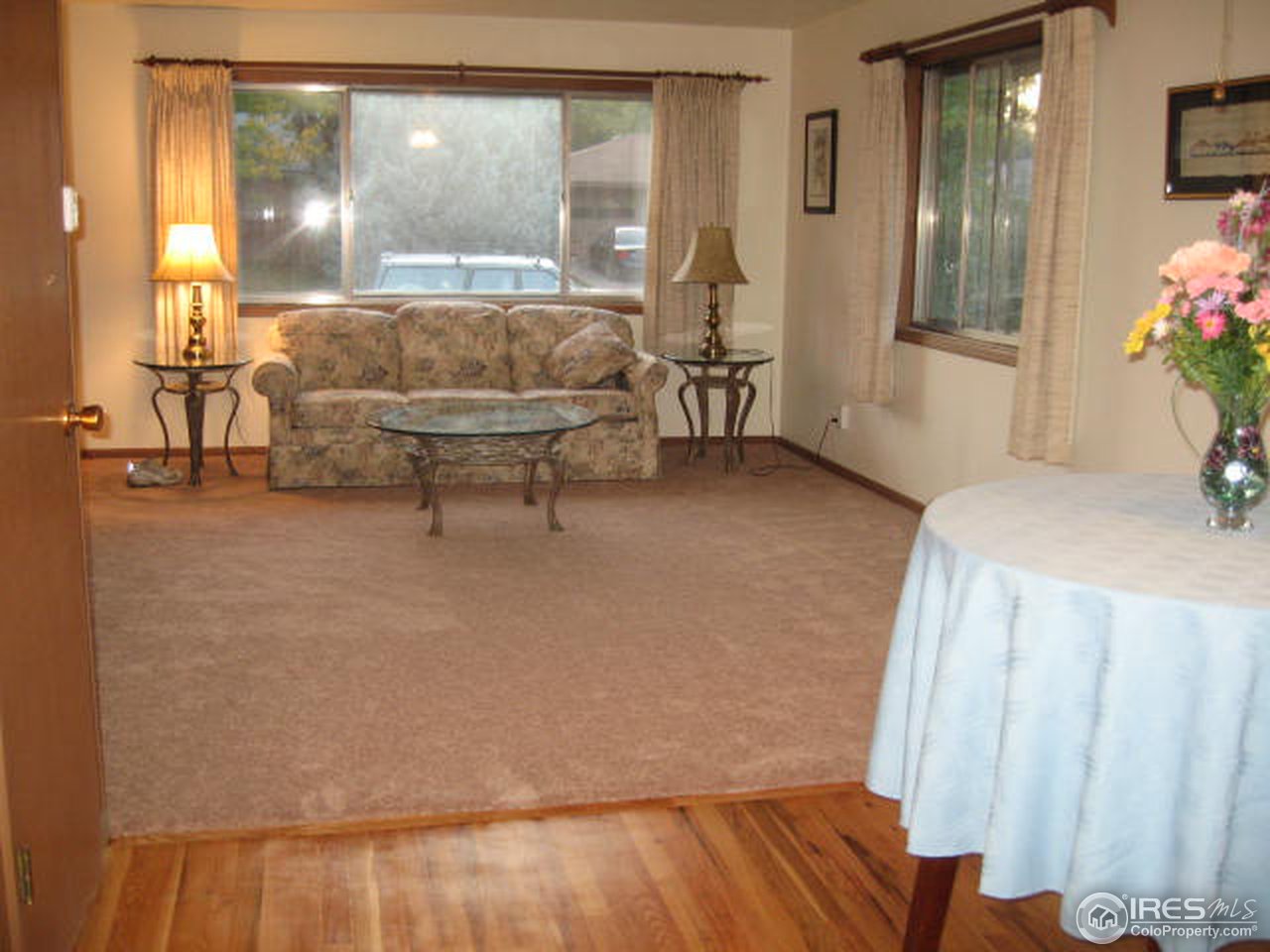 1208 Baker Street Fort Collins, CO 80524 - Photo 2 of 25 a living room with furniture and a potted plant