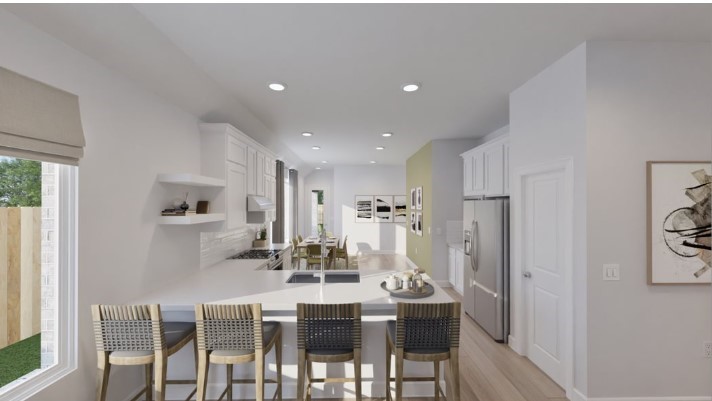5718 Goosander Land Drive Baytown, TX 77521 - Photo 12 of 17 a view of a dining room with furniture