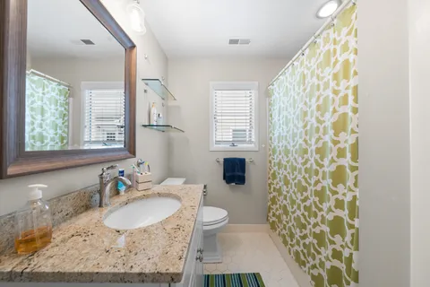 a view of a kitchen with sink and dishwasher