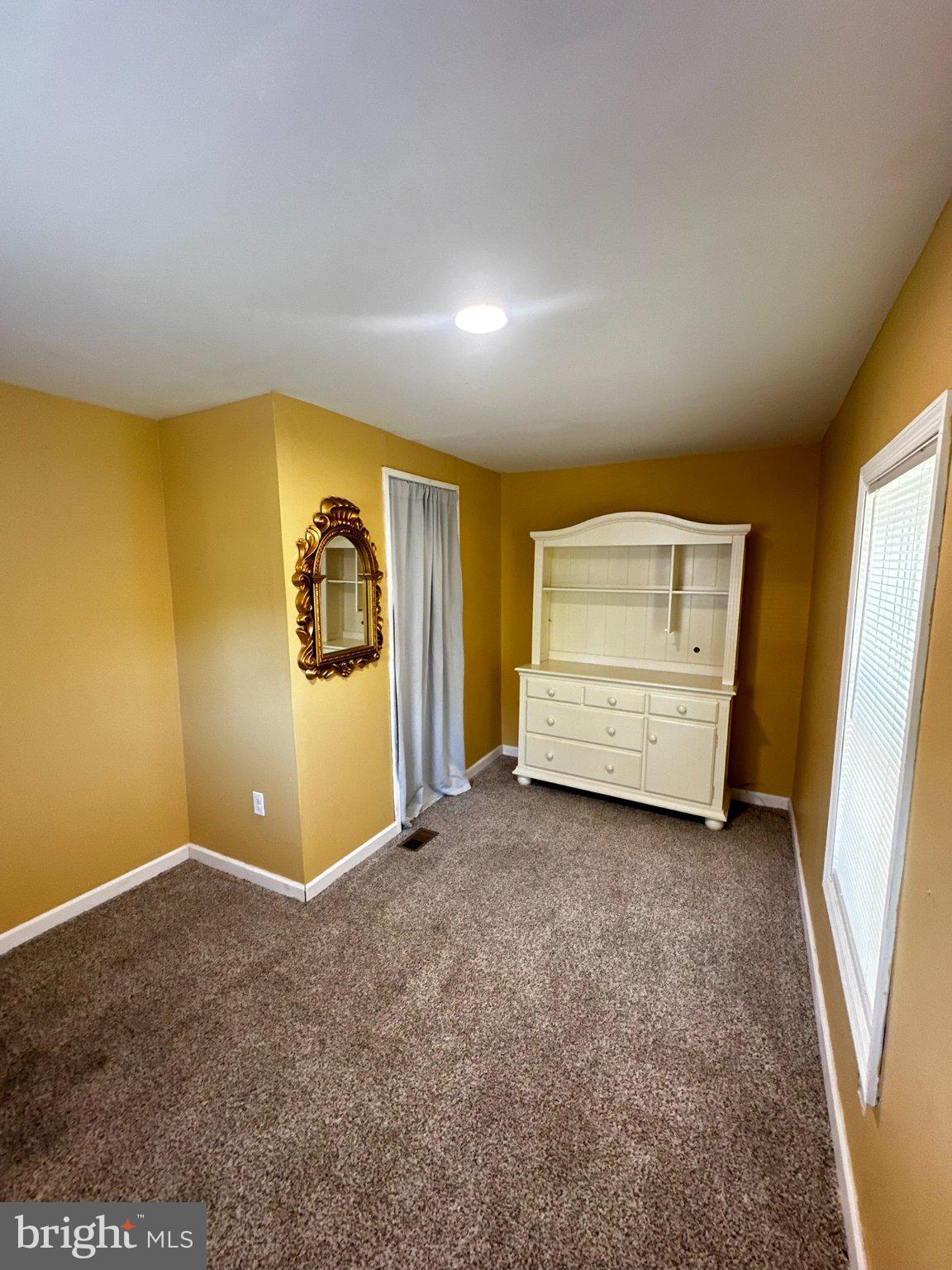 31777 Siham Road Lewes, DE 19958 - Photo 23 of 46 Bright, inviting room with warm tones.