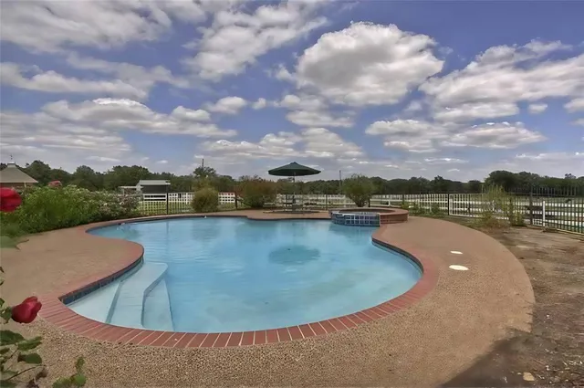 a view of a room with wooden walls
