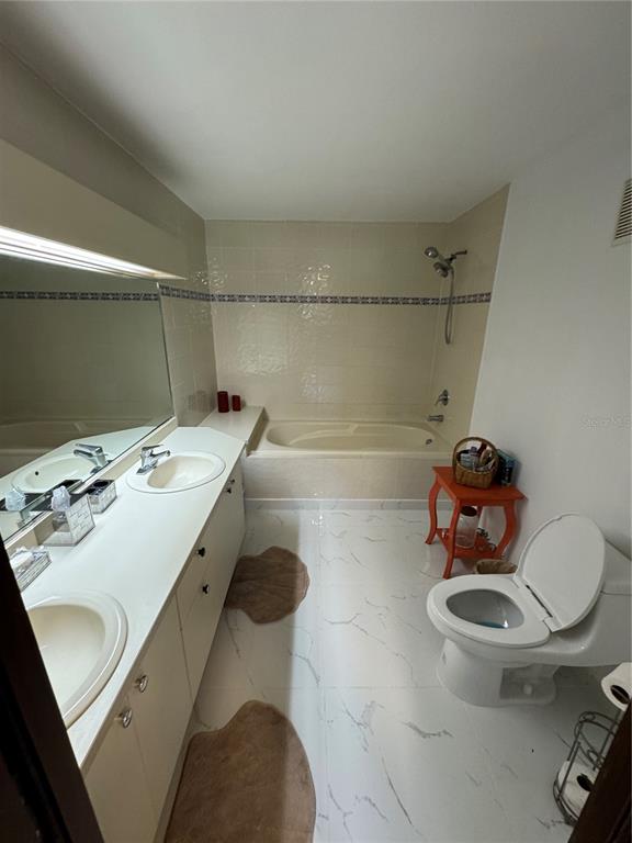 Villas De Golf East Villas De Golf East Dorado Del Mar Boulevard, Unit 91 Dorado, PR 00646 - Photo 12 of 15 a bathroom with a sink toilet and shower