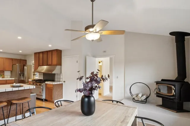a view of a workspace with furniture