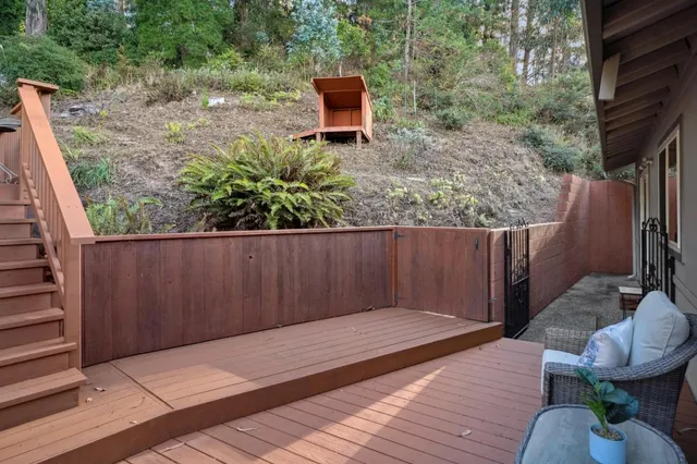 a backyard of a house with seating space