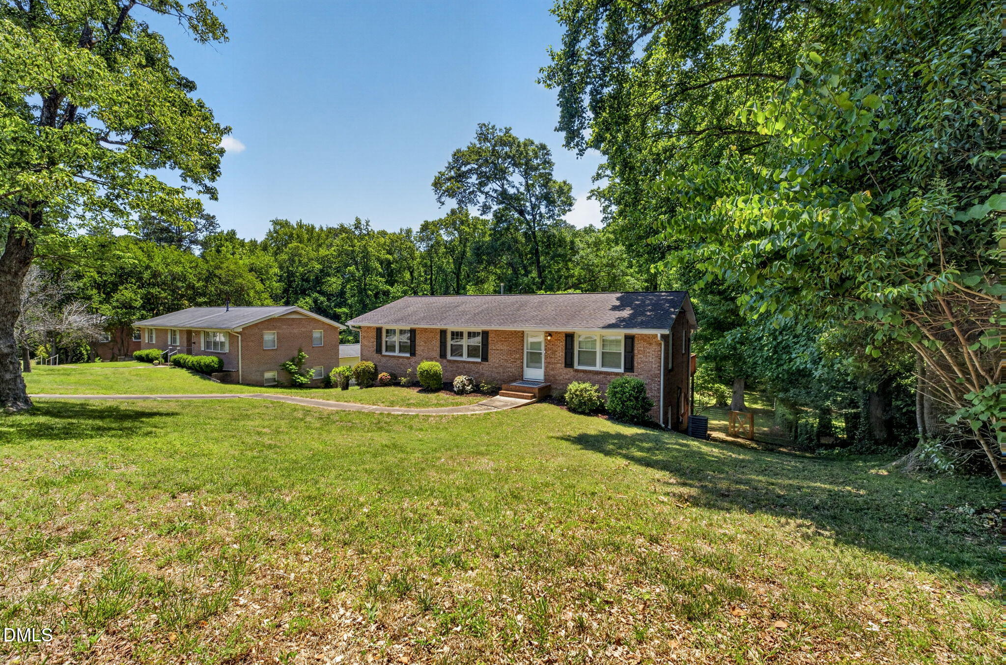 1224 Pineview Drive Raleigh, NC 27606 - Photo 1 of 45 a front view of a house with garden