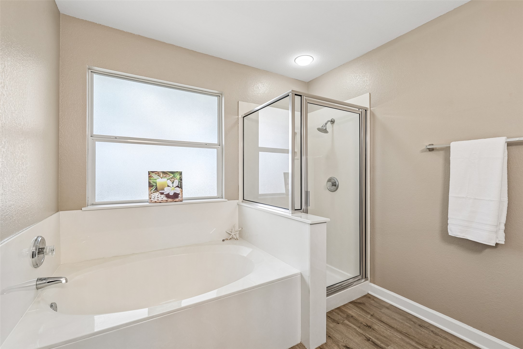 152 Grant Way Kyle, TX 78640 - Photo 28 of 39 a bathroom with a bathtub and a shower