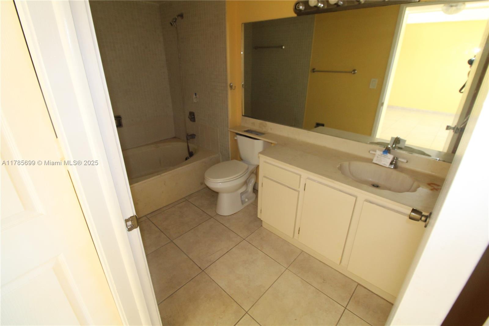 Fountainebleau Miami, FL 33172 - Photo 6 of 17 a bathroom with a sink and a mirror