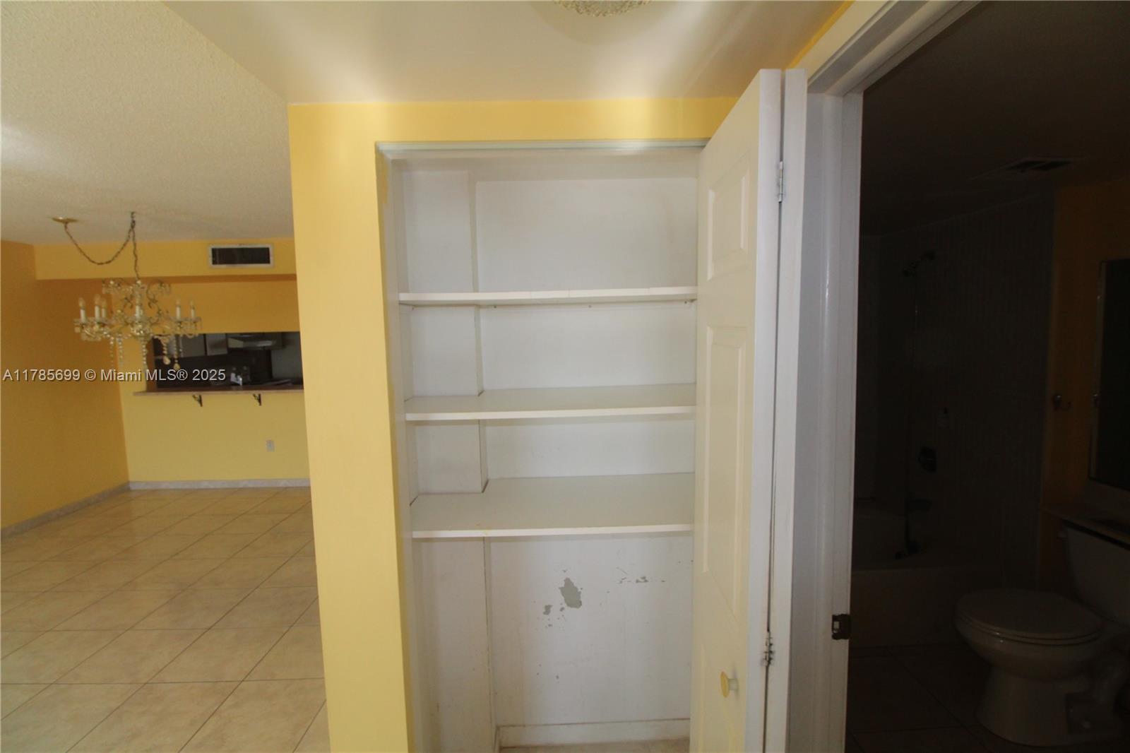 Fountainebleau Miami, FL 33172 - Photo 9 of 17 a view of a walk in closet