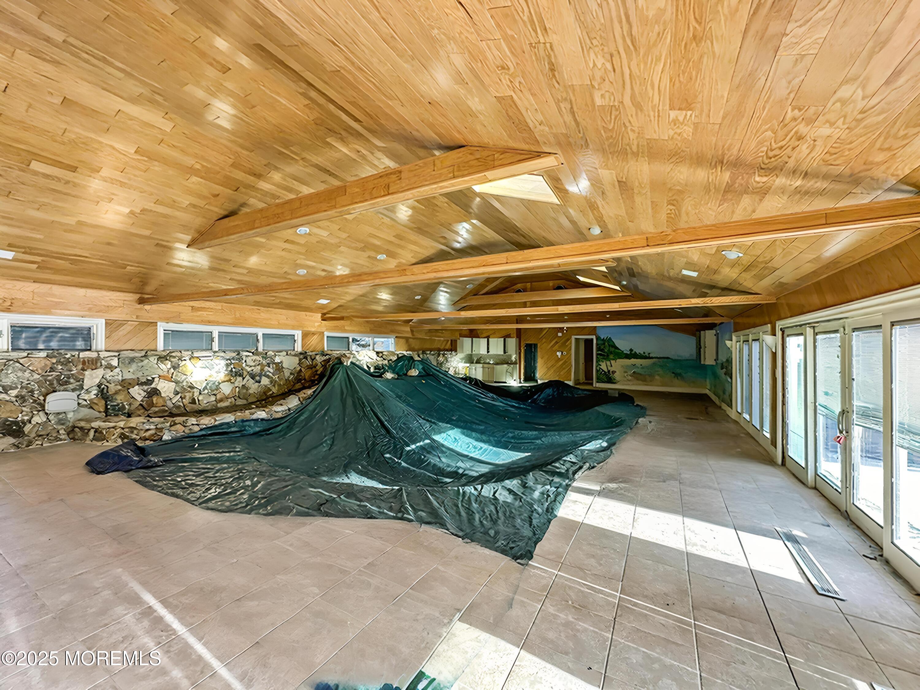 105 Middletown Road Holmdel, NJ 07733 - Photo 13 of 54 a view of a backyard of the house