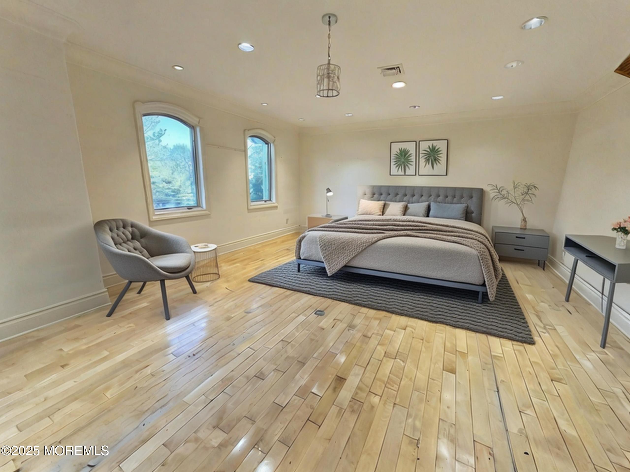 105 Middletown Road Holmdel, NJ 07733 - Photo 20 of 54 a spacious bedroom with a bed a couch and dresser