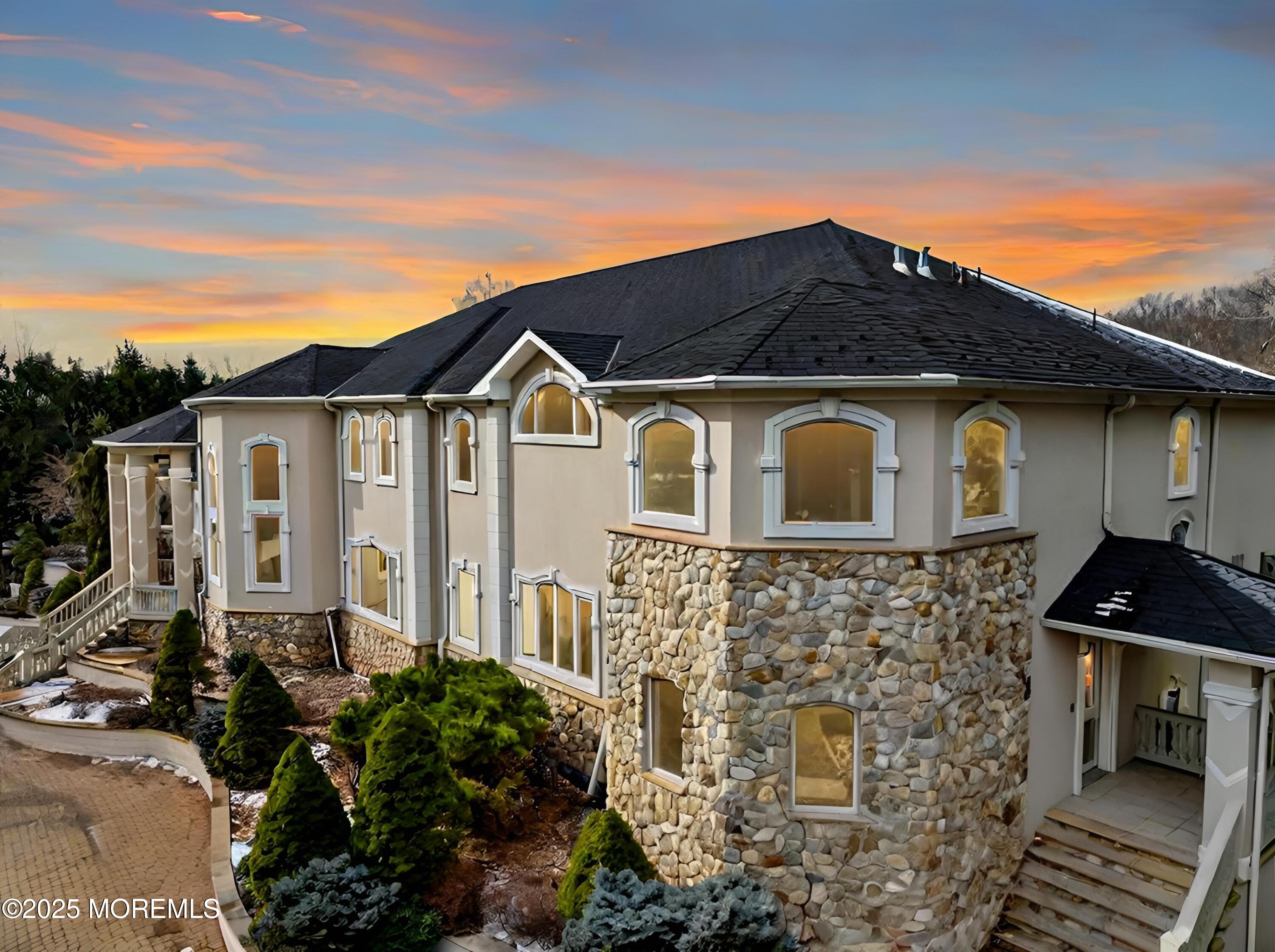 105 Middletown Road Holmdel, NJ 07733 - Photo 2 of 54 a front view of a house with a yard