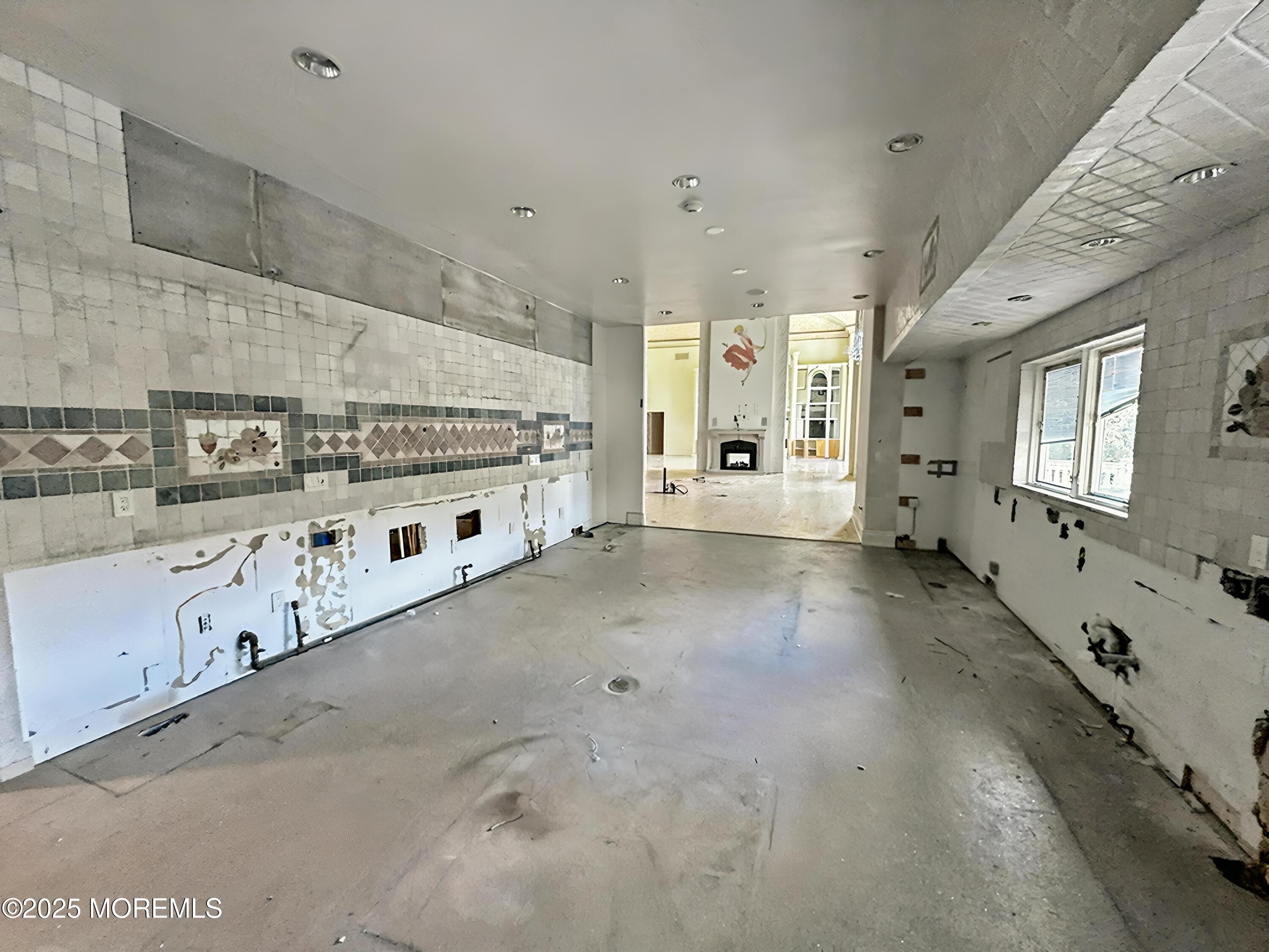 105 Middletown Road Holmdel, NJ 07733 - Photo 21 of 54 a large white room with stainless steel appliances