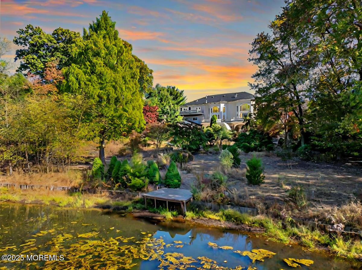 105 Middletown Road Holmdel, NJ 07733 - Photo 4 of 54 a view of a chairs in a backyard