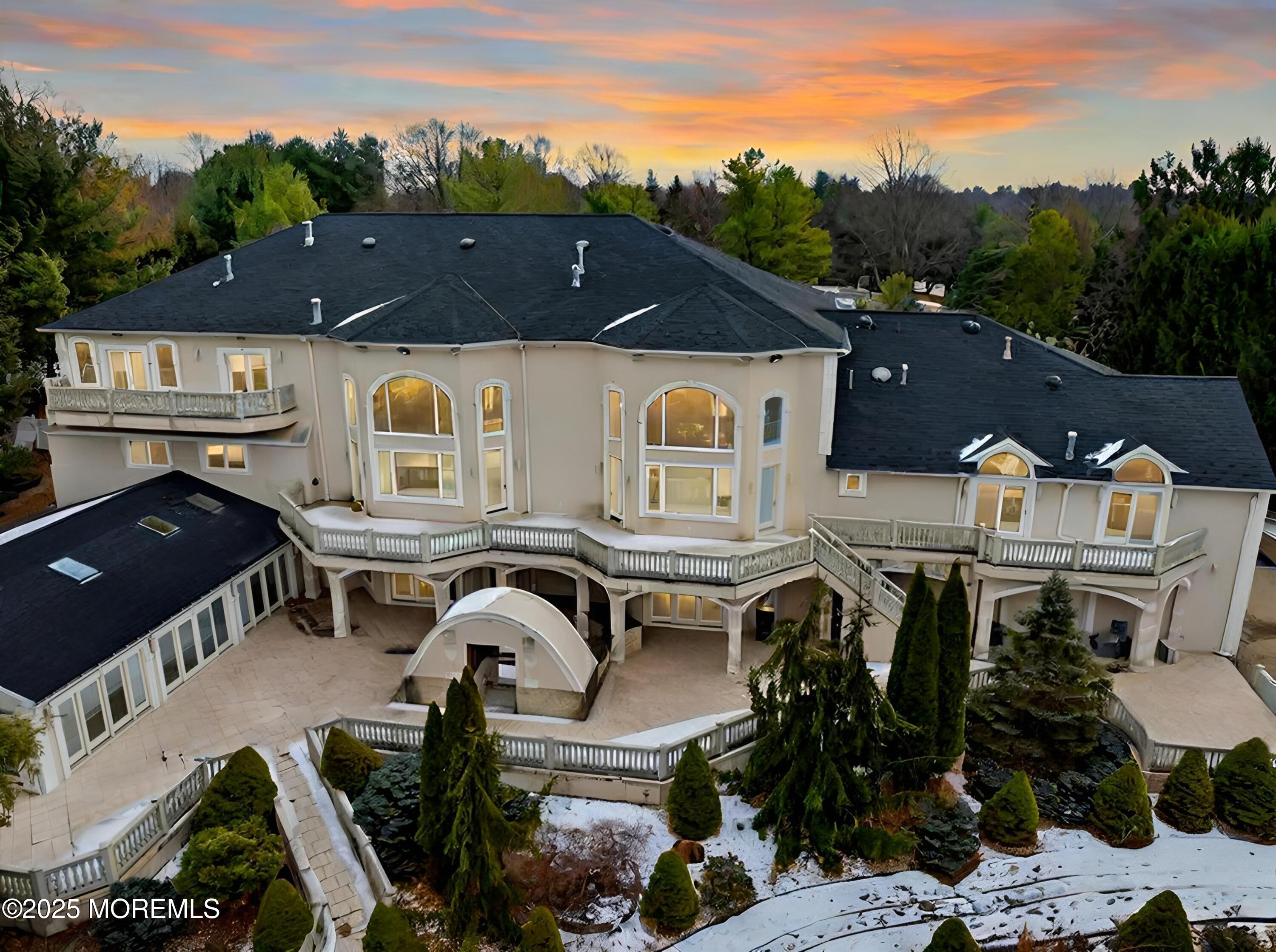 105 Middletown Road Holmdel, NJ 07733 - Photo 6 of 54 an aerial view of a house with swimming pool