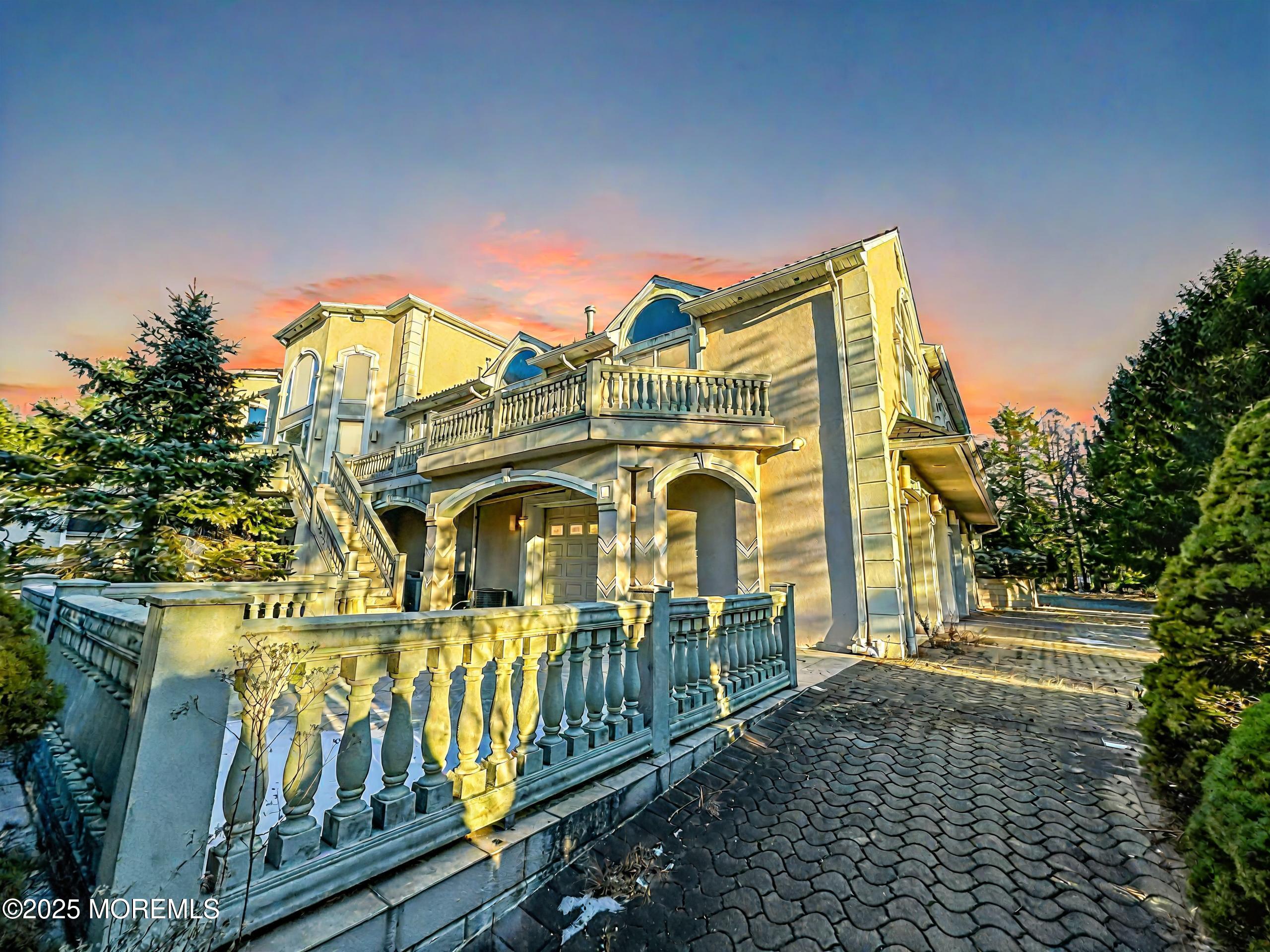 105 Middletown Road Holmdel, NJ 07733 - Photo 8 of 54 a view of a large building with large windows
