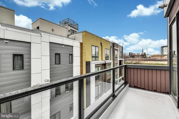 a view of a building from a balcony
